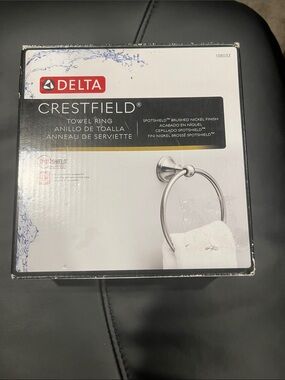 Delta Crestfield Towel Ring in Black and White Packaging